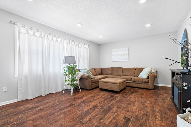 11345 Brenda Blvd, Becker, MN 55308 - living room with dark wood finished floors, recessed lighting, a textured ceiling, and baseboards