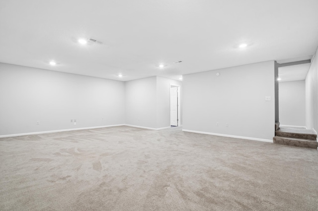 11345 Brenda Blvd, Becker, MN 55308 - finished below grade area with recessed lighting, carpet, baseboards, and stairs