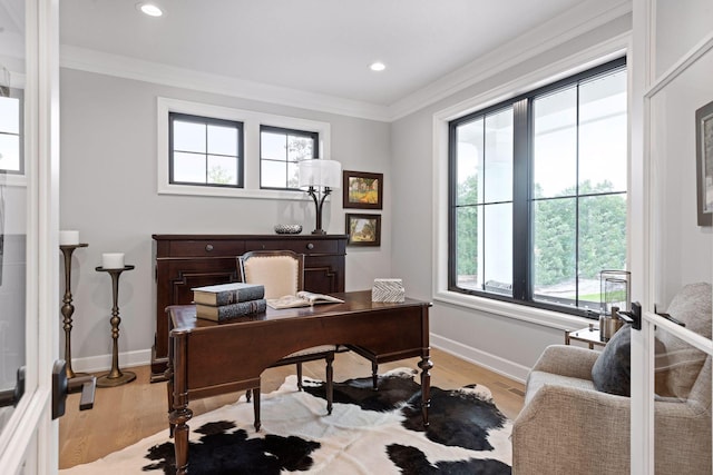home office with light wood finished floors, baseboards, crown molding, and recessed lighting