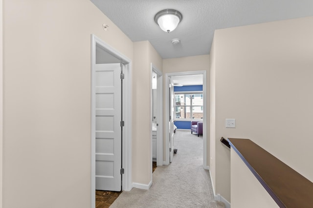 4025 River Valley Way, Eagan, MN 55122 - hall with carpet flooring, a textured ceiling, and baseboards