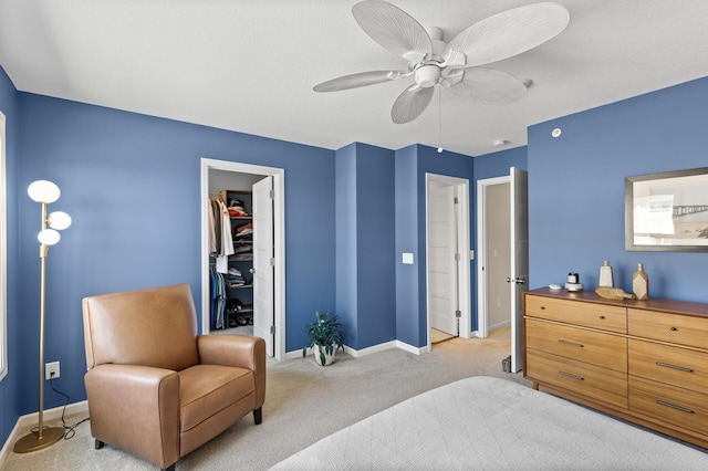 4025 River Valley Way, Eagan, MN 55122 - bedroom featuring baseboards, light colored carpet, a spacious closet, ceiling fan, and a closet