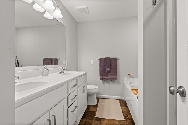 4025 River Valley Way, Eagan, MN 55122 - bathroom featuring stone finish flooring, toilet, double vanity, a bath, and baseboards