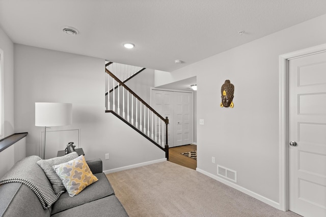 4025 River Valley Way, Eagan, MN 55122 - living room featuring stairway, carpet flooring, and baseboards