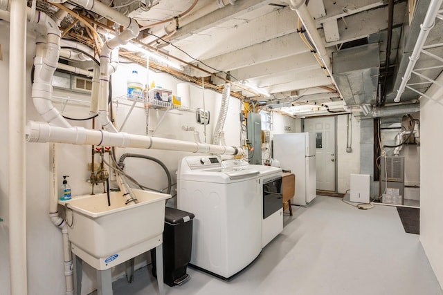laundry room featuring independent washer and dryer and laundry area