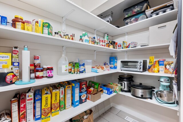 storage area featuring a toaster