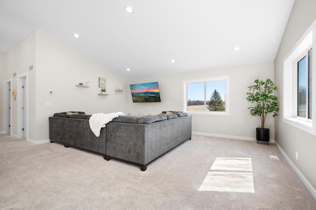 living room featuring recessed lighting, visible vents, baseboards, and light carpet