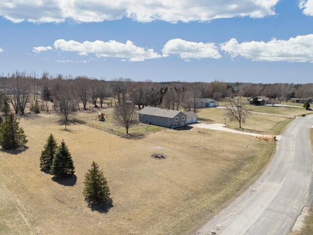 birds eye view of property featuring a rural view