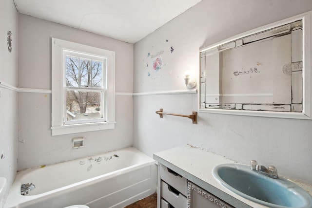 bathroom with a bath and vanity