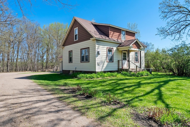 100 Stark Rd, Harris, MN 55032 - view of front facade featuring a front yard and a shingled roof