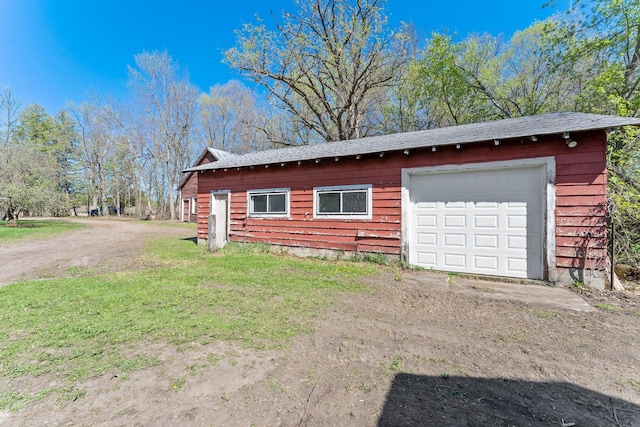 100 Stark Rd, Harris, MN 55032 - garage with dirt driveway