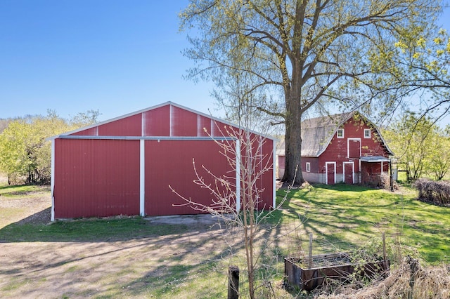 100 Stark Rd, Harris, MN 55032 - view of barn with a yard