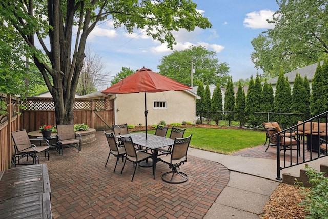 view of patio featuring outdoor dining area