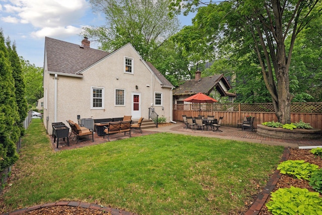 back of property featuring a patio, a shingled roof, central AC, a chimney, and entry steps