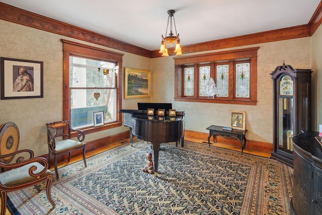 1767 Fremont Ave S, Minneapolis, MN 55403 - sitting room with crown molding, wood finished floors, and wallpapered walls