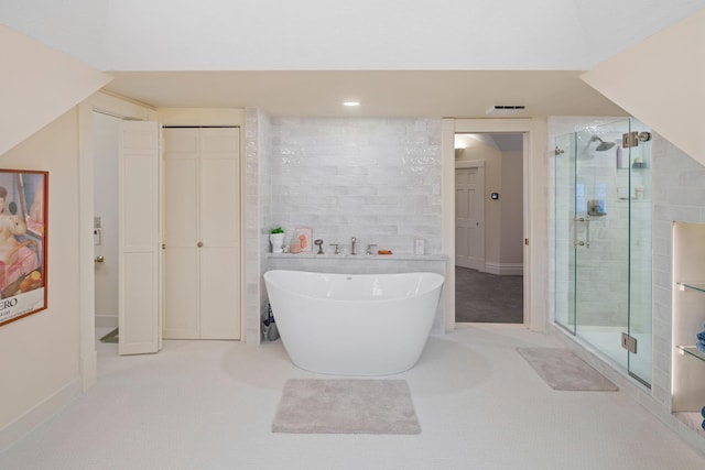 1767 Fremont Ave S, Minneapolis, MN 55403 - full bathroom with a shower stall and a freestanding bath