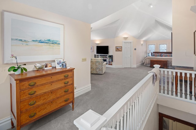 1767 Fremont Ave S, Minneapolis, MN 55403 - hallway featuring carpet floors, lofted ceiling, and an upstairs landing