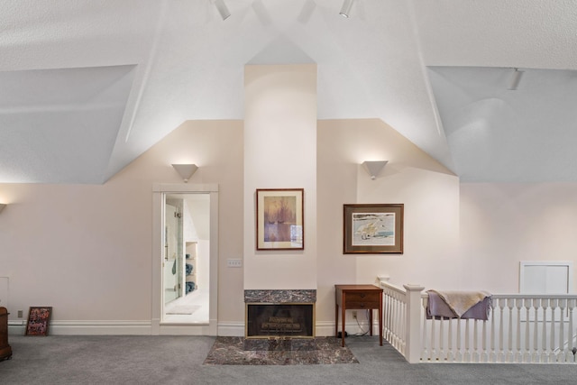 1767 Fremont Ave S, Minneapolis, MN 55403 - carpeted living area with vaulted ceiling and baseboards