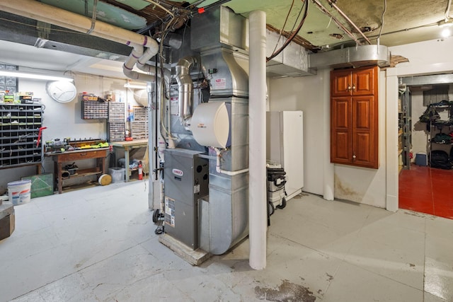 1767 Fremont Ave S, Minneapolis, MN 55403 - unfinished below grade area featuring a workshop area and heating unit