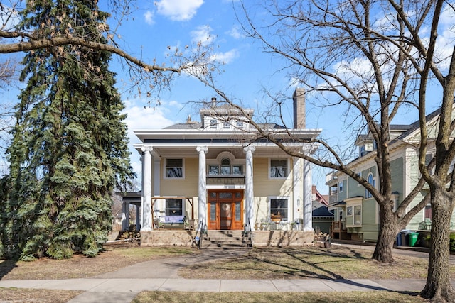 1767 Fremont Ave S, Minneapolis, MN 55403 - neoclassical / greek revival house with a porch, a chimney, and driveway