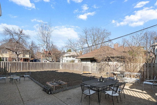 1767 Fremont Ave S, Minneapolis, MN 55403 - fenced backyard featuring outdoor dining area and a patio area