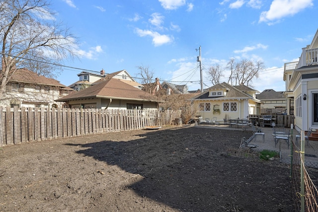 1767 Fremont Ave S, Minneapolis, MN 55403 - fenced backyard with a patio area and an outdoor structure