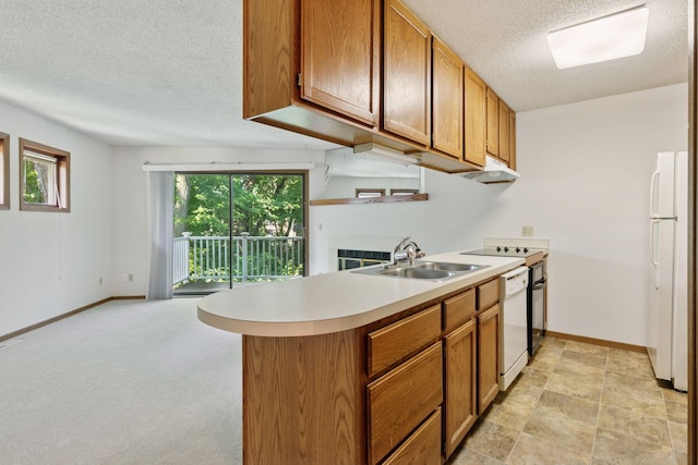 3635 Saint Francis Way Unit B, Eagan, MN 55123 - kitchen with white appliances, brown cabinets, a textured ceiling, light countertops, and under cabinet range hood