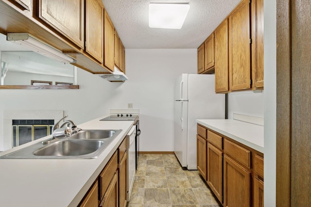 3635 Saint Francis Way Unit B, Eagan, MN 55123 - kitchen featuring light countertops, brown cabinets, freestanding refrigerator, under cabinet range hood, and stone finish floors