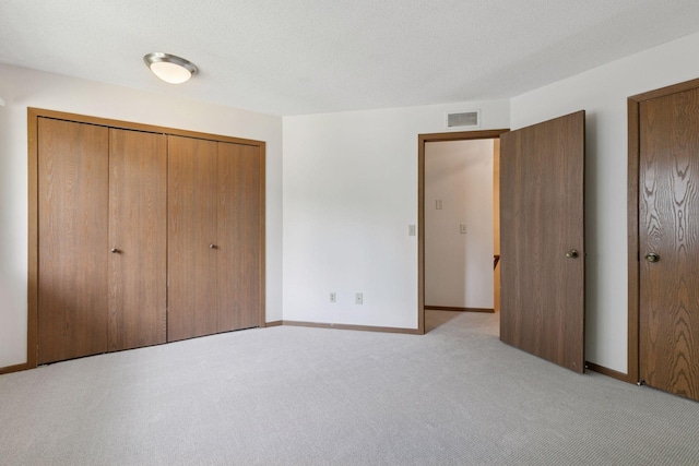 3635 Saint Francis Way Unit B, Eagan, MN 55123 - unfurnished bedroom featuring light colored carpet and a closet