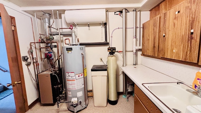 utilities featuring water heater and a sink