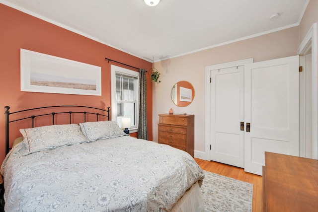 3542 Garfield Ave Unit 3, Minneapolis, MN 55408 - bedroom featuring light wood-type flooring and crown molding