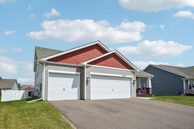 7538 Ochoa Ave NE, Otsego, MN 55330 - craftsman house featuring a garage and driveway