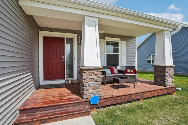7538 Ochoa Ave NE, Otsego, MN 55330 - doorway to property with an outdoor living space and a lawn