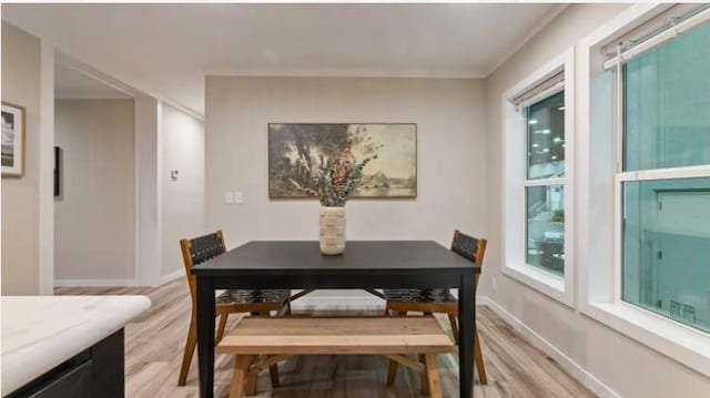 000 Pine Ave S, Sandstone, MN 55072 - dining space featuring light wood finished floors and baseboards