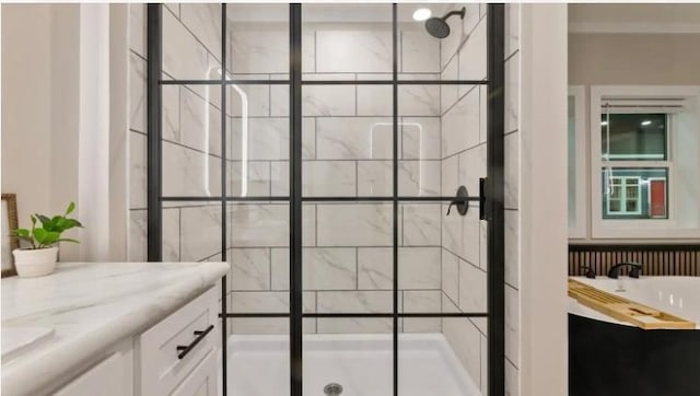 000 Pine Ave S, Sandstone, MN 55072 - bathroom with a stall shower, vanity, and a tub