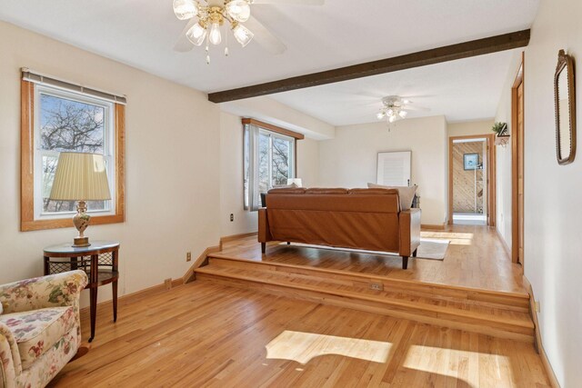 828 143rd St, Garfield Twp, WI 54001 - corridor featuring light wood-style floors, baseboards, and beam ceiling