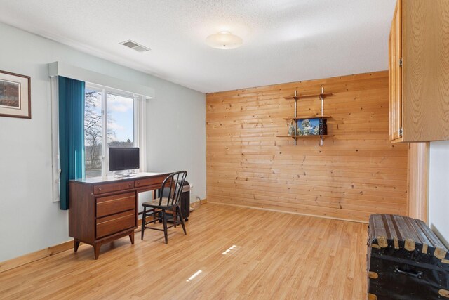 828 143rd St, Garfield Twp, WI 54001 - office space featuring wooden walls, light wood finished floors, and baseboards