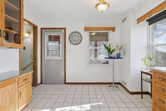 828 143rd St, Garfield Twp, WI 54001 - doorway with baseboards and light tile patterned floors