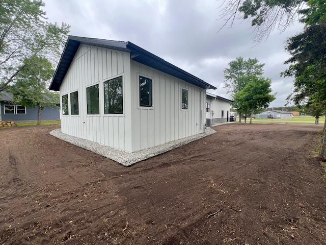 123 River View Rd, Ottertail, MN 56571 - view of property exterior with board and batten siding