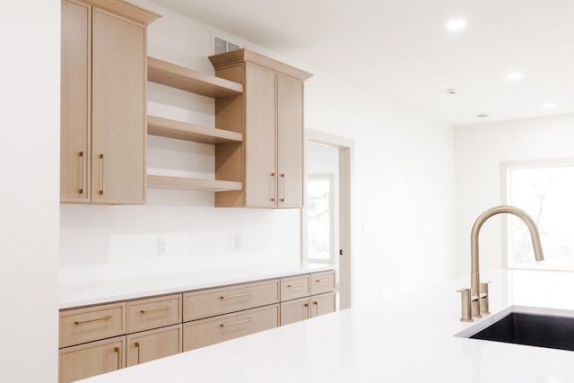 123 River View Rd, Ottertail, MN 56571 - kitchen featuring light brown cabinets, open shelves, light countertops, and recessed lighting