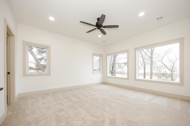 123 River View Rd, Ottertail, MN 56571 - spare room featuring healthy amount of natural light, light carpet, recessed lighting, and ceiling fan