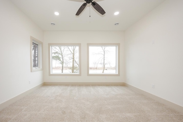 123 River View Rd, Ottertail, MN 56571 - spare room with light colored carpet, recessed lighting, and a ceiling fan