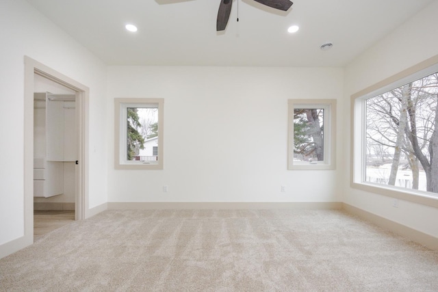 123 River View Rd, Ottertail, MN 56571 - unfurnished bedroom with carpet floors, multiple windows, recessed lighting, and ceiling fan