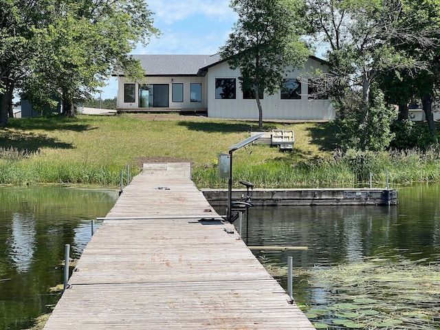 123 River View Rd, Ottertail, MN 56571 - dock with a water view and a yard