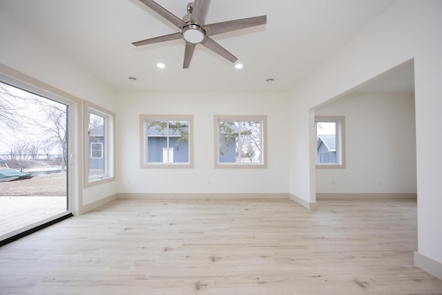 123 River View Rd, Ottertail, MN 56571 - empty room featuring plenty of natural light, light wood finished floors, a ceiling fan, and recessed lighting