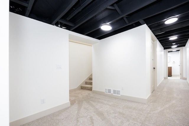 123 River View Rd, Ottertail, MN 56571 - finished below grade area with carpet floors and stairs