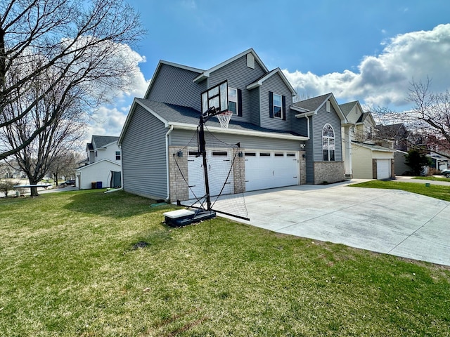 view of home's exterior featuring brick siding, a yard, an attached garage, and concrete driveway