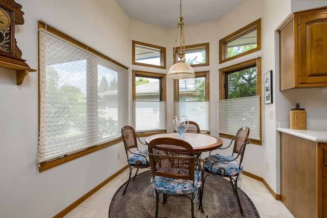 8991 Ferndale Ln, Eden Prairie, MN 55347 - dining space with baseboards and light tile patterned flooring