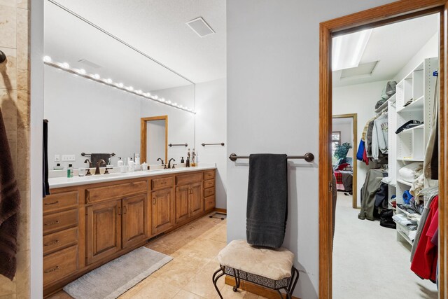 8991 Ferndale Ln, Eden Prairie, MN 55347 - bathroom featuring a sink and double vanity