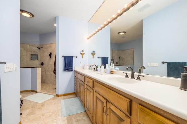 8991 Ferndale Ln, Eden Prairie, MN 55347 - full bath featuring a sink, baseboards, a walk in shower, and double vanity