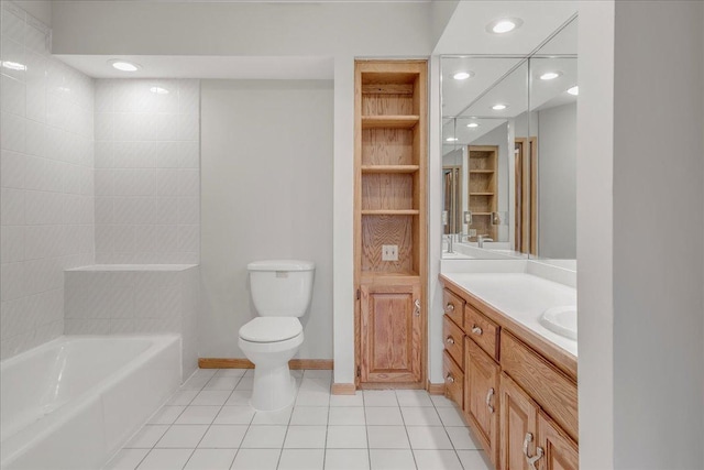 bathroom with recessed lighting, tile patterned flooring, toilet, vanity, and a bathtub